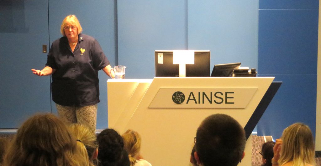 Dr Erica Smyth on-stage in the AINSE Theatre, December 2017